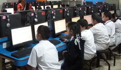 Students taking test in computer lab
