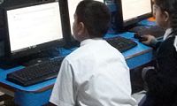 Students taking a test on computer video  